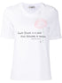 Camiseta flores adornos